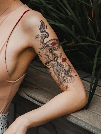 Upper Arm Tattoos for Women: A Beautiful Canvas for Art and Meaning