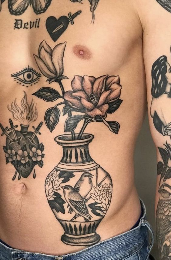 18 Unique Stomach Tattoo Ideas for Men: Inspiring Designs from Tribal Symbols