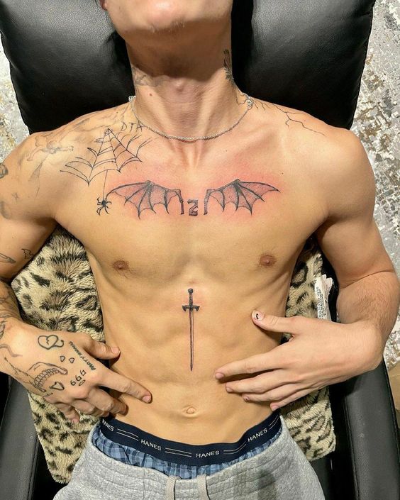 18 Unique Stomach Tattoo Ideas for Men: Inspiring Designs from Tribal Symbols