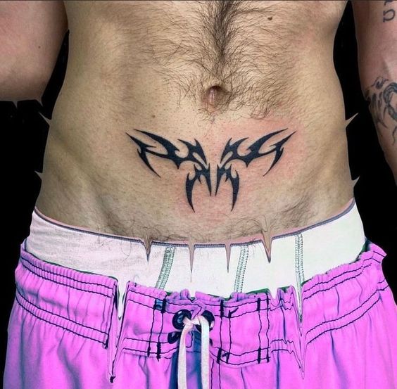 18 Unique Stomach Tattoo Ideas for Men: Inspiring Designs from Tribal Symbols